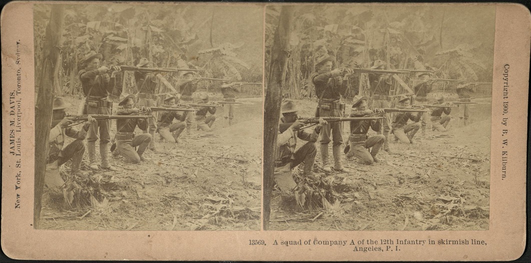A squad of Company A of the 12th Infantry in skirmish line, Angeles, P. I.